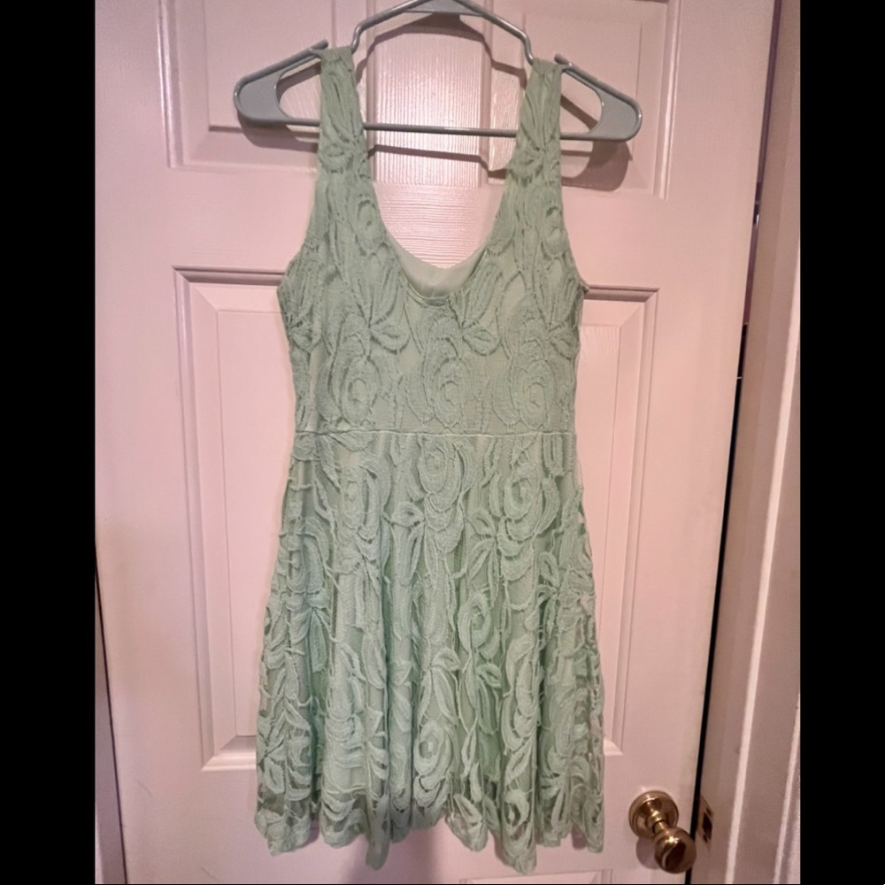 Light Teal green dress that was worn for weddings, events, looks beautiful on